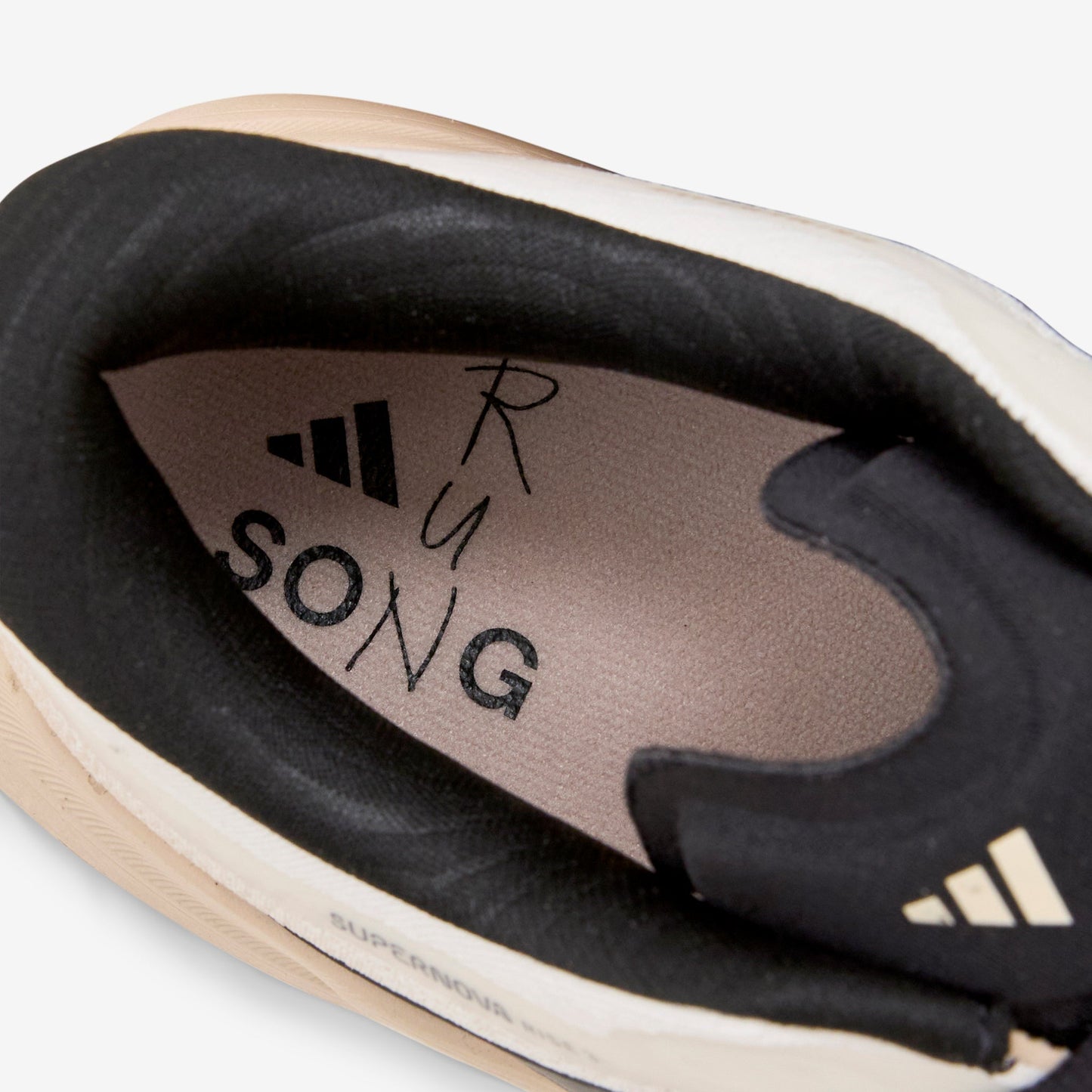 Song for the Mute x Women's Supernova Rise 3 Off White | Core Black | Onix
