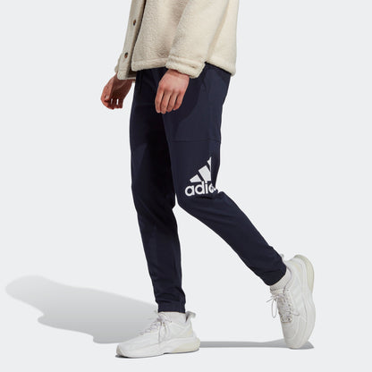 Men's adidas Essentials Single Jersey Tapered Badge of Sport Pants