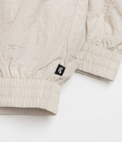 Nike SB Pavan Track Jacket - Light Orewood Brown / Black / Black / White